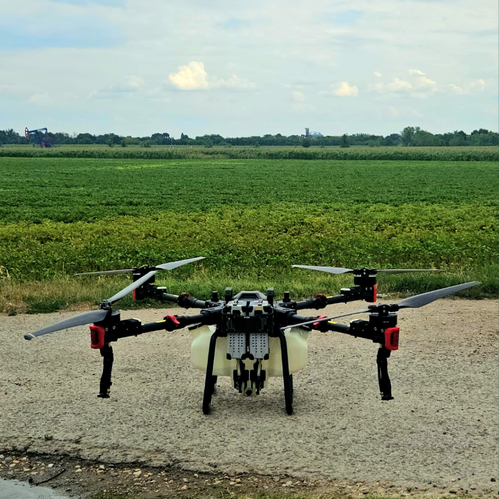 XAG P100 Pro drone performing targeted insecticide and amino acid application on soybean field using Agremo variable rate map